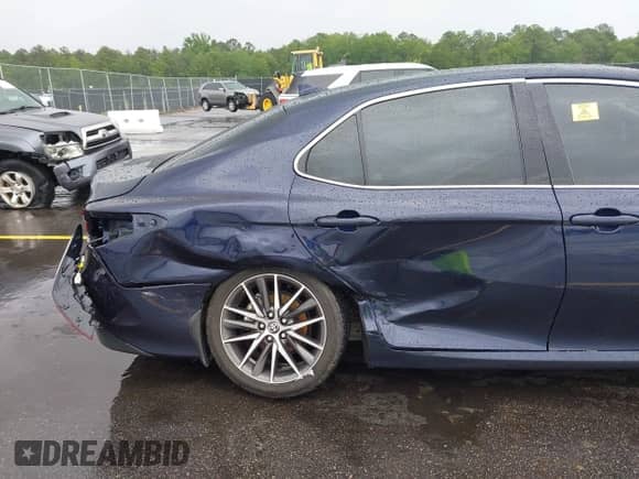 2021 Toyota Camry Hybrid XLE with VIN 4T1F31AK4MU546558, listed as a IAAI auction lot 42235763 with 62,299 mi miles and . Bid and sale history available at DreamBid. Image 6.