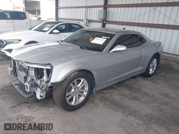 2015 Chevrolet Camaro LS with VIN 2G1FB1E31F9301350, listed as a IAAI auction lot 42897332 with 150,113 mi miles and . Bid and sale history available at DreamBid. Image 2.