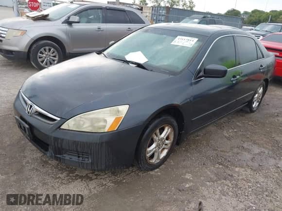 2006 Honda Accord EX with VIN 1HGCM56766A115435, listed as a IAAI auction lot 43117814 with 192,240 mi miles and . Bid and sale history available at DreamBid. Image 2.
