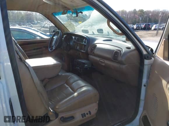 2002 Dodge RAM with VIN 3B7KC23W82M212169, listed as a IAAI auction lot 41861188 with 106,660 mi miles and . Bid and sale history available at DreamBid. Image 5.