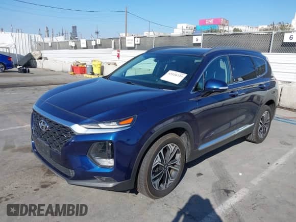 2019 Hyundai Santa Fe Limited z VIN 5NMS53AA0KH079790, wystawiony jako IAAI lot #43324739 z przebiegiem 96 579 mil mil oraz . Historia ofert i sprzedaży dostępna na DreamBid. Obrazek 2.