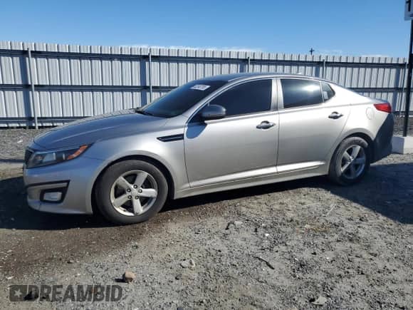 2015 Kia Optima LX with VIN KNAGM4A71F5547258, listed as a Copart auction lot 82240795 with 194,110 mi miles and Salvage title. Bid and sale history available at DreamBid. Image 1.