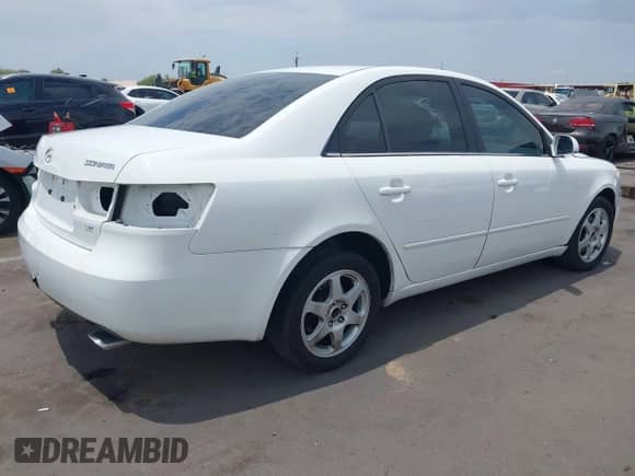 2006 Hyundai Sonata GLS z VIN 5NPEU46FX6H115522, wystawiony jako IAAI lot #42766167 z przebiegiem 115 518 mil mil oraz . Historia ofert i sprzedaży dostępna na DreamBid. Obrazek 4.