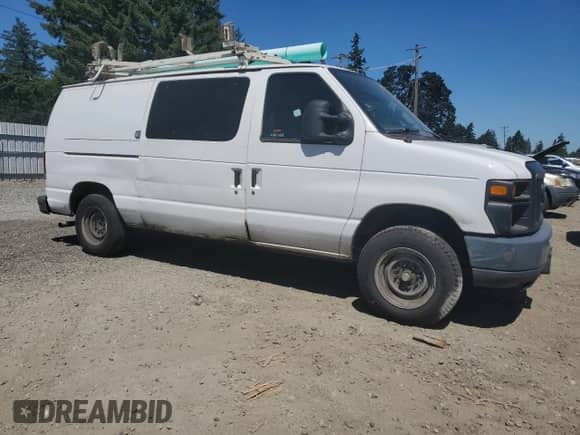 2012 Ford Econoline Cargo Commercial with VIN 1FTNE1EW2CDB34452, listed as a Copart auction lot 66587925 with 212,296 mi miles and Clean title. Bid and sale history available at DreamBid. Image 4.