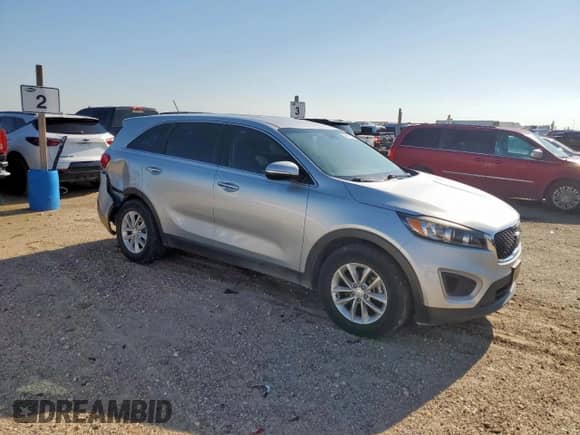 2018 Kia Sorento LX with VIN 5XYPG4A33JG411415, listed as a Copart auction lot 69861555 with 114,822 mi miles and Clean title. Bid and sale history available at DreamBid. Image 4.