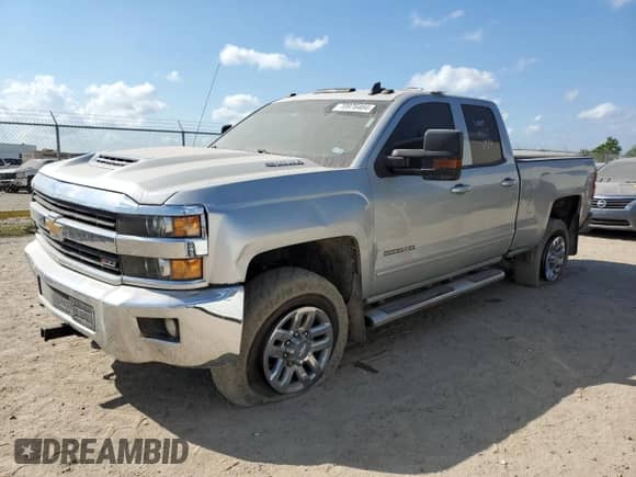 2017 Chevrolet Silverado 2500HD LT с VIN 1GC2KVEY1HZ268819, выставлен на аукционе Copart как лот 70976484 с пробегом 185 345 миль миль и Списание • Salvage title. История ставок и продаж доступна на DreamBid. Изображение 1.