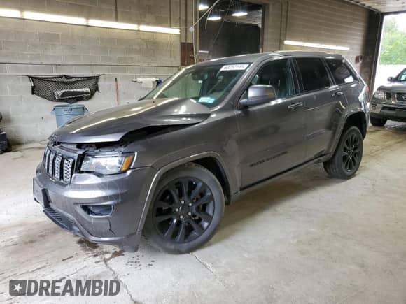 2018 Jeep Grand Cherokee Laredo with VIN 1C4RJFAGXJC487078, listed as a Copart auction lot 63752115 with 69,126 mi miles and Salvage title. Bid and sale history available at DreamBid. Image 1.