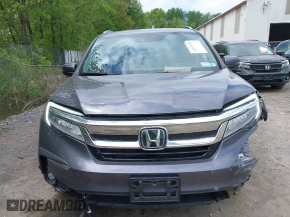 2021 Honda Pilot Touring 7-Passenger с VIN 5FNYF6H69MB005833, выставлен на аукционе IAAI как лот 42299145 с пробегом 66 621 миль миль и . История ставок и продаж доступна на DreamBid. Изображение 12.