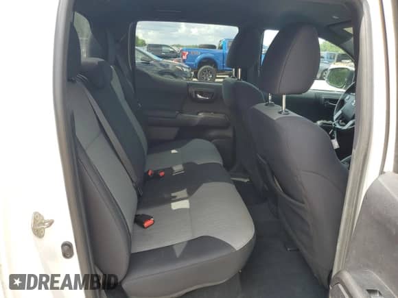 2020 Toyota Tacoma TRD Off Road с VIN 3TMCZ5AN4LM323432, выставлен на аукционе Copart как лот 59711425 с пробегом 46 664 миль миль и Списание • Salvage title. История ставок и продаж доступна на DreamBid. Изображение 10.