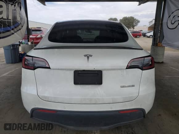 2022 Tesla Model Y Performance с VIN 7SAYGDEF0NF487098, выставлен на аукционе Copart как лот 80744715 с пробегом 39 557 миль миль и Списание • Salvage title. История ставок и продаж доступна на DreamBid. Изображение 6.