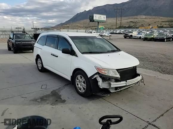 2013 Honda Odyssey LX z VIN 5FNRL5H2XDB082747, wystawiony jako Copart lot #80600695 z przebiegiem 110 873 mil mil oraz Szkoda całkowita • Salvage title. Historia ofert i sprzedaży dostępna na DreamBid. Obrazek 14.