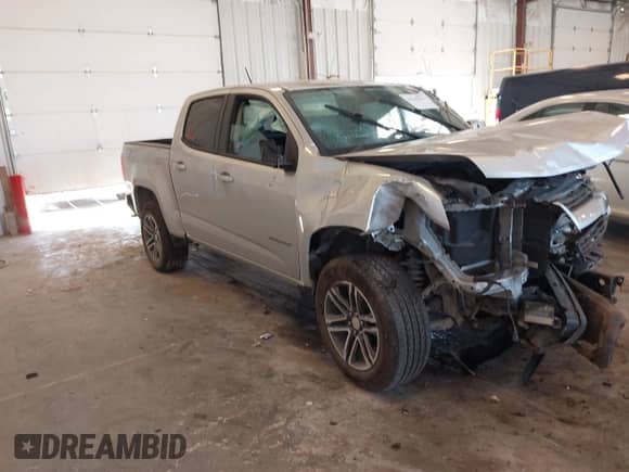 2020 Chevrolet Colorado 4WD Work Truck z VIN 1GCGTBEN0L1214104, wystawiony jako IAAI lot #43236234 z przebiegiem 92 366 mil mil oraz . Historia ofert i sprzedaży dostępna na DreamBid. Obrazek 1.