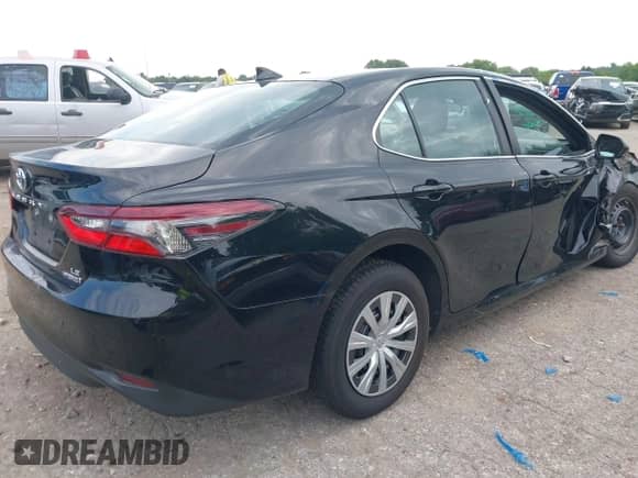 2022 Toyota Camry Hybrid LE with VIN 4T1C31AK3NU585808, listed as a IAAI auction lot 42633297 with 34,066 mi miles and . Bid and sale history available at DreamBid. Image 4.