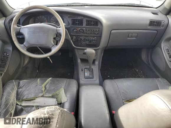 1992 Toyota Camry с VIN JT2VK13E7N0096822, выставлен на аукционе Copart как лот 71635274 с пробегом 172 511 миль миль и Списание • Salvage title. История ставок и продаж доступна на DreamBid. Изображение 8.