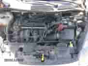 2014 Ford Fiesta S z VIN 3FADP4AJXEM148677, wystawiony jako IAAI lot #43308790 z przebiegiem 163 001 mil mil oraz . Historia ofert i sprzedaży dostępna na DreamBid. Obrazek 10.