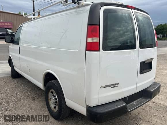 2013 Chevrolet Express Cargo с VIN 1GCWGFCA0D1149389, выставлен на аукционе Copart как лот 63786165 с пробегом 185 664 миль миль и Чистый • Clean title. История ставок и продаж доступна на DreamBid. Изображение 3.
