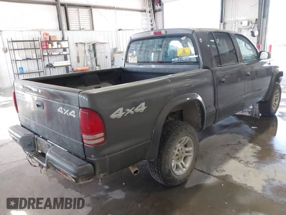 2003 Dodge Dakota с VIN 1D7HG38ZX3S137450, выставлен на аукционе IAAI как лот 41789140 с пробегом 281 759 миль миль и . История ставок и продаж доступна на DreamBid. Изображение 4.