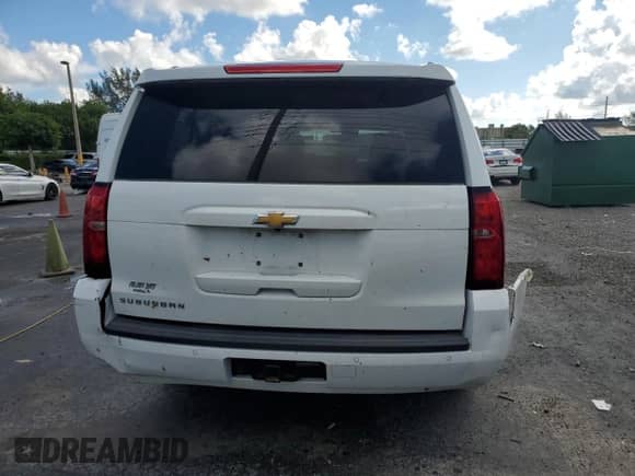 2018 Chevrolet Suburban LT z VIN 1GNSCHKC6JR102283, wystawiony jako Copart lot #85882115 z przebiegiem 128 900 mil mil oraz Szkoda całkowita • Salvage title. Historia ofert i sprzedaży dostępna na DreamBid. Obrazek 6.