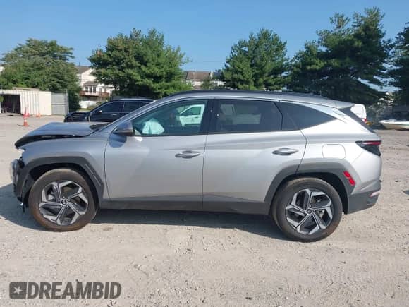 2024 Hyundai Tucson Limited z VIN KM8JECD10RU230603, wystawiony jako IAAI lot #42949425 z przebiegiem 10 616 mil mil oraz . Historia ofert i sprzedaży dostępna na DreamBid. Obrazek 14.