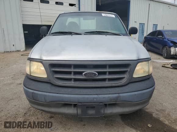 2003 Ford F-150 XL с VIN 1FTRF17W03NA77433, выставлен на аукционе Copart как лот 66132055 с пробегом 353 736 миль миль и Чистый • Clean title. История ставок и продаж доступна на DreamBid. Изображение 5.
