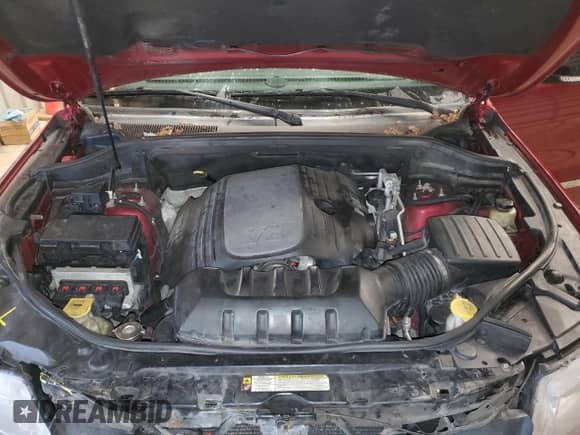 2012 Jeep Grand Cherokee Limited z VIN 1C4RJFBT9CC325666, wystawiony jako Copart lot #85650175 z przebiegiem 158 571 mil mil oraz Szkoda całkowita • Salvage title. Historia ofert i sprzedaży dostępna na DreamBid. Obrazek 12.