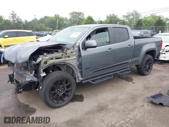 2020 Chevrolet Colorado 4WD LT with VIN 1GCGTCEN7L1235246, listed as a IAAI auction lot 42600889 with 57,012 mi miles and . Bid and sale history available at DreamBid. Image 18.