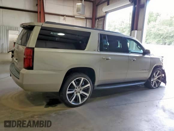 2016 Chevrolet Suburban LT с VIN 1GNSCHKC5GR170003, выставлен на аукционе Copart как лот 69984505 с пробегом 157 565 миль миль и Списание • Salvage title. История ставок и продаж доступна на DreamBid. Изображение 3.