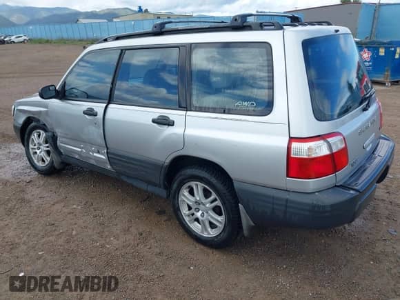 2002 Subaru Forester L with VIN JF1SF63592H747060, listed as a IAAI auction lot 42261765 with 204,112 mi miles and . Bid and sale history available at DreamBid. Image 3.