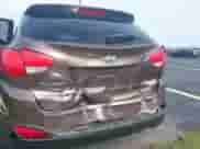 2014 Hyundai Tucson Limited with VIN KM8JU3AGXEU833578, listed as a IAAI auction lot 42646016 with 122,387 mi miles and . Bid and sale history available at DreamBid. Image 6.