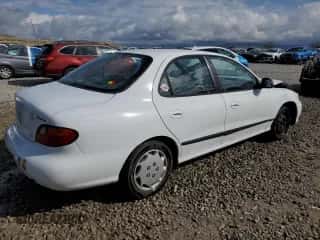 1998 Hyundai Elantra с VIN KMHJF24M5WU679823, выставлен на аукционе Copart как лот 47642105 с пробегом 116 318 миль миль и Списание • Salvage title. История ставок и продаж доступна на DreamBid. Изображение 3.
