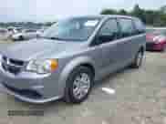 2016 Dodge Grand Caravan SE with VIN 2C4RDGBG7GR176607, listed as a IAAI auction lot 42894963 with 75,350 mi miles and . Bid and sale history available at DreamBid. Image 2.