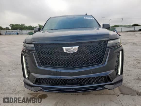 2024 Cadillac Escalade AWD V-Series z VIN 1GYS4HK97RR159978, wystawiony jako Copart lot #61041575 z przebiegiem Nie podano mil oraz Szkoda całkowita • Salvage title. Historia ofert i sprzedaży dostępna na DreamBid. Obrazek 5.