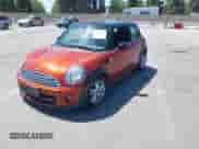 2013 MINI Hardtop with VIN WMWSU3C50DT682661, listed as a IAAI auction lot 42294482 with 114,066 mi miles and . Bid and sale history available at DreamBid. Image 2.