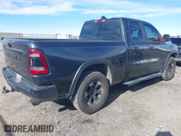 2020 Ram 1500 Rebel with VIN 1C6SRFET1LN295970, listed as a IAAI auction lot 41290288 with 146,496 mi miles and . Bid and sale history available at DreamBid. Image 4.