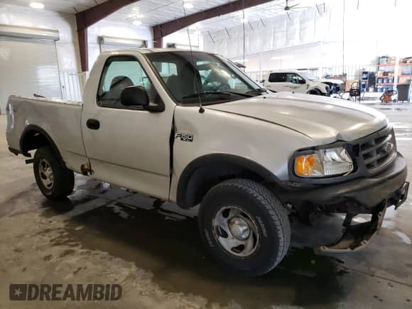 2003 Ford F-150 XL z VIN 1FTRF18273NB92414, wystawiony jako Copart lot #71539794 z przebiegiem Nie podano mil oraz Szkoda całkowita • Salvage title. Historia ofert i sprzedaży dostępna na DreamBid. Obrazek 4.