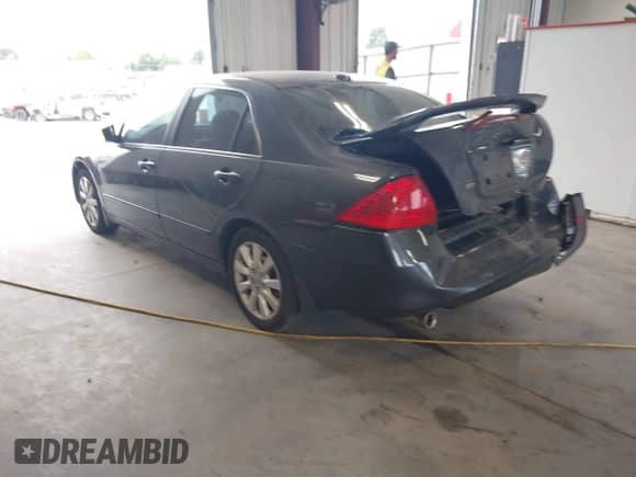 2007 Honda Accord EX-L with VIN 1HGCM66877A066892, listed as a IAAI auction lot 42791667 with 151,757 mi miles and . Bid and sale history available at DreamBid. Image 3.