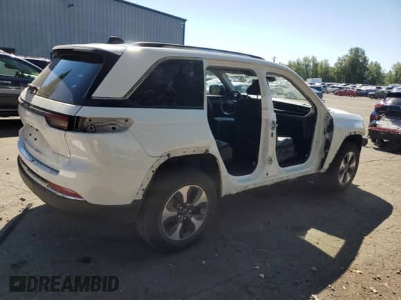 2023 Jeep Grand Cherokee with VIN 1C4RJYB68PC624075, listed as a Copart auction lot 66038905 with 49,274 mi miles and Salvage title. Bid and sale history available at DreamBid. Image 3.