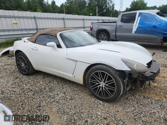 2008 Saturn Sky Red Line with VIN 1G8MF35X48Y119653, listed as a Copart auction lot 63591595 with 140,643 mi miles and Clean title. Bid and sale history available at DreamBid. Image 4.