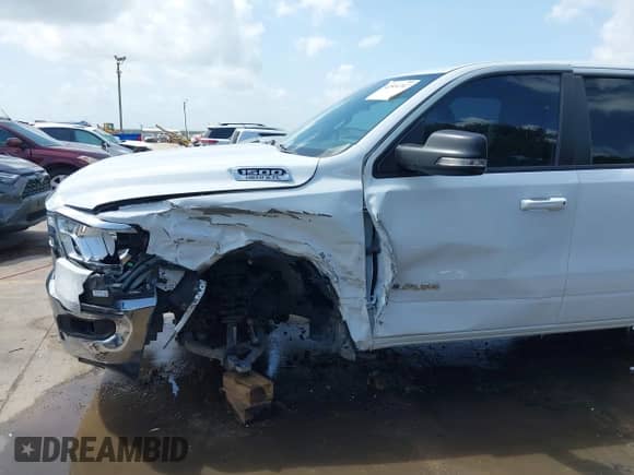 2022 Ram 1500 Big Horn z VIN 1C6RREBT8NN190343, wystawiony jako IAAI lot #42514747 z przebiegiem 65 593 mil mil oraz . Historia ofert i sprzedaży dostępna na DreamBid. Obrazek 6.