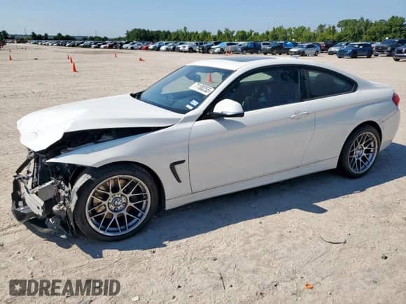 2019 BMW 4 Series 430i with VIN WBA4W3C57KAG91422, listed as a Copart auction lot 71100255 with 91,847 mi miles and Salvage title. Bid and sale history available at DreamBid. Image 1.