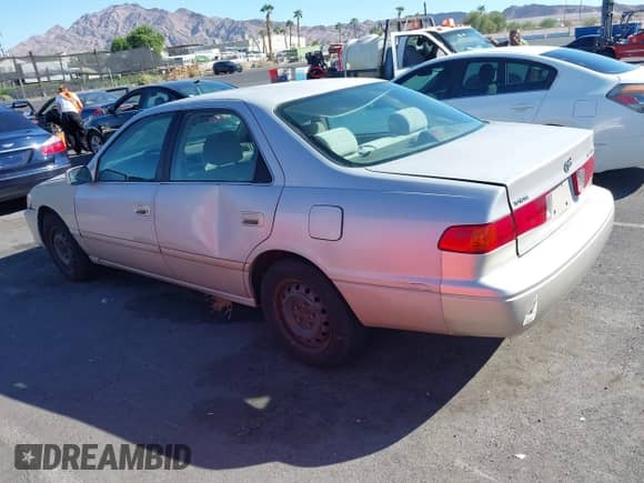 2001 Toyota Camry CE with VIN 4T1BG22K71U118065, listed as a IAAI auction lot 43334917 with 199,235 mi miles and . Bid and sale history available at DreamBid. Image 3.