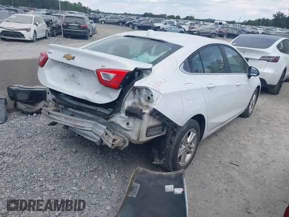 2018 Chevrolet Cruze LT с VIN 1G1BE5SM5J7153286, выставлен на аукционе IAAI как лот 43123664 с пробегом 97 154 миль миль и . История ставок и продаж доступна на DreamBid. Изображение 4.