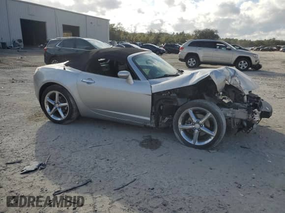 2009 Saturn Sky Red Line with VIN 1G8MT35X69Y104310, listed as a Copart auction lot 87369754 with 62,428 mi miles and Salvage title. Bid and sale history available at DreamBid. Image 4.