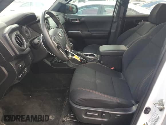 2020 Toyota Tacoma SR5 с VIN 3TMAZ5CNXLM128164, выставлен на аукционе Copart как лот 71077555 с пробегом 79 553 миль миль и Чистый • Clean title. История ставок и продаж доступна на DreamBid. Изображение 7.
