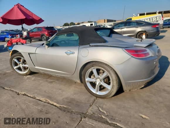 2009 Saturn Sky Red Line с VIN 1G8MT35X79Y104008, выставлен на аукционе Copart как лот 80136355 с пробегом 94 455 миль миль и Списание • Salvage title. История ставок и продаж доступна на DreamBid. Изображение 2.
