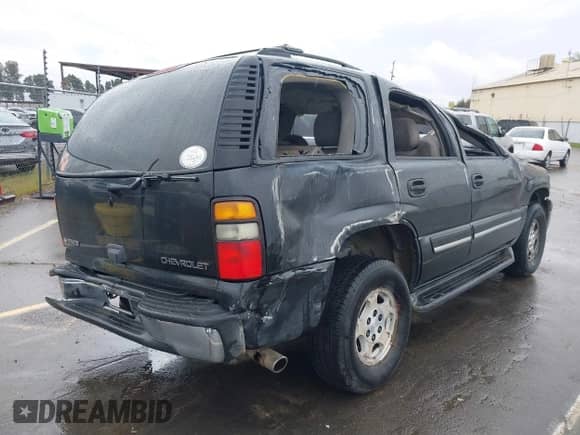 2005 Chevrolet Tahoe Z71 z VIN 1GNEC13T15R205653, wystawiony jako IAAI lot #41808672 z przebiegiem 210 261 mil mil oraz . Historia ofert i sprzedaży dostępna na DreamBid. Obrazek 4.
