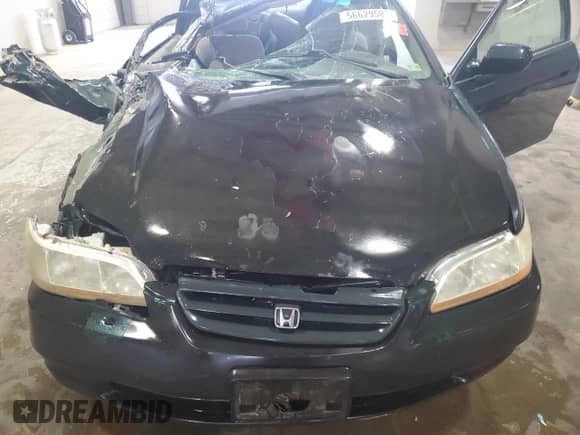 1999 Honda Accord EX with VIN 1HGCG3272XA026660, listed as a Copart auction lot 56629585 with 180,716 mi miles and Salvage title. Bid and sale history available at DreamBid. Image 11.