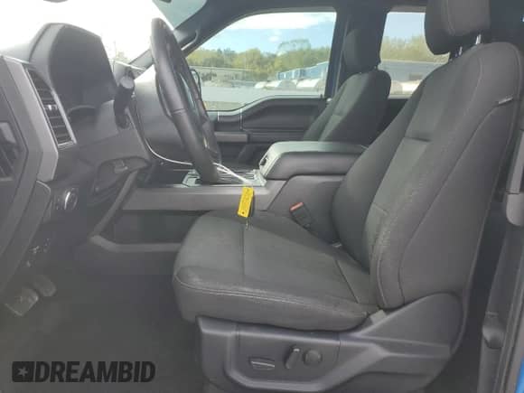 2019 Ford F-150 XLT with VIN 1FTFX1E5XKKE89692, listed as a Copart auction lot 85272735 with 63,499 mi miles and Salvage title. Bid and sale history available at DreamBid. Image 7.