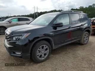 2025 Honda Passport TrailSport with VIN 5FNYF8H60SB018141, listed as a Copart auction lot 64741805 with 8,398 mi miles and Salvage title. Bid and sale history available at DreamBid. Image 1.