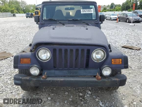 1997 Jeep Wrangler Sport with VIN 1J4FY19S8VP446600, listed as a Copart auction lot 60625905 with 70,322 mi miles and Clean title. Bid and sale history available at DreamBid. Image 5.